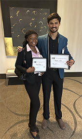 Janet and Tahmid photo with awards