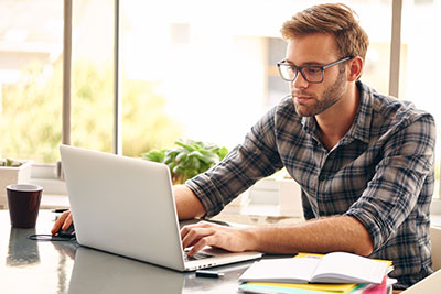 Student studying on laptop